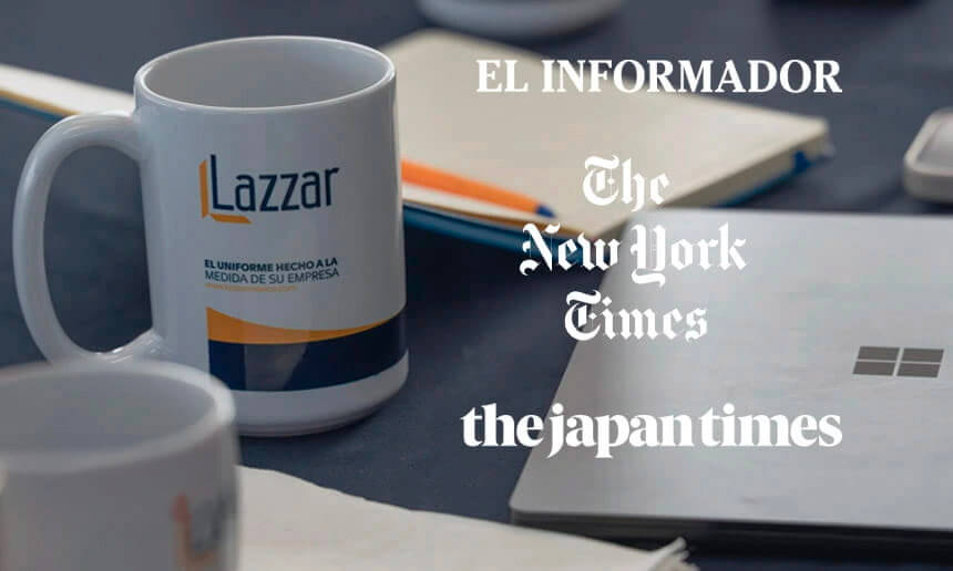 Mug with the Lazzar logo alongside press mentions: El Informador, The New York Times, and The Japan Times